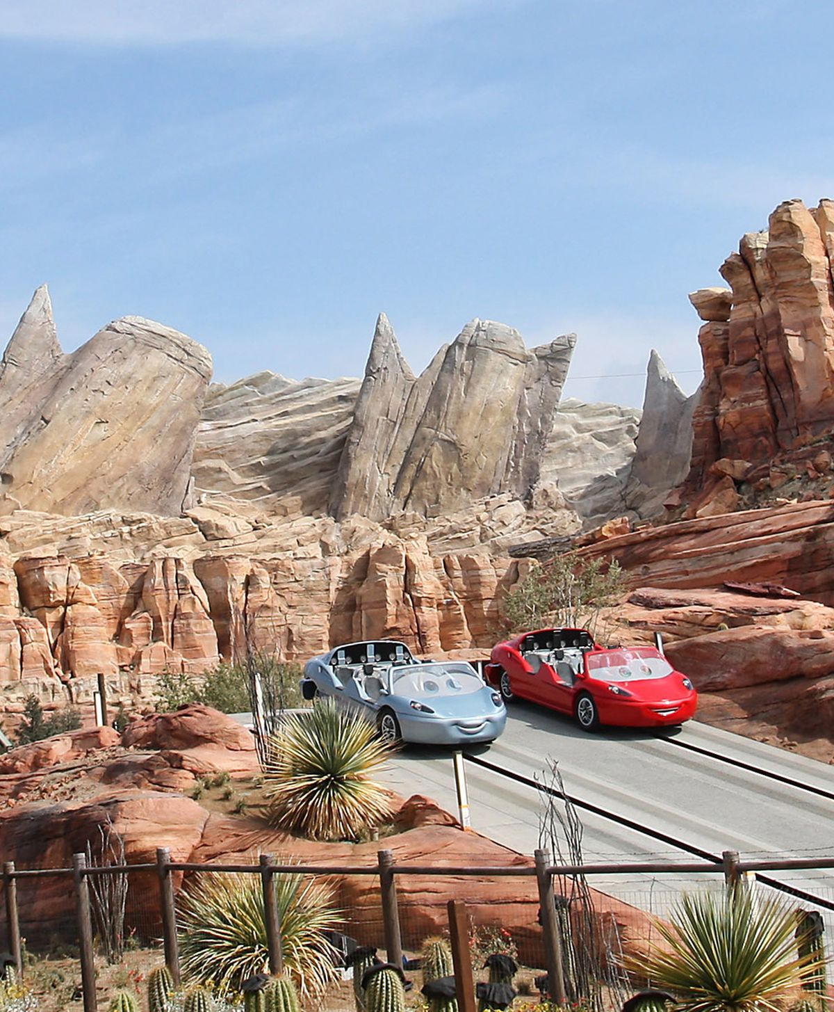 In this image from Disney theme parks, Radiator Springs Racers are shown at Cars Land, a new attraction based on the animated series “Cars,” at Disney California Adventure park in Anaheim, Calif. (Associated Press)