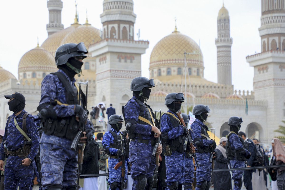 Members of Houthi security forces stand guard during an anti-Israel and anti-U.S. rally on Jan. 19, 2024, in the capital Sanaa, Yemen. (Mohammed Huwais/AFP)