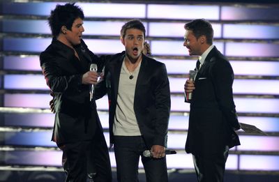 This photo provided by Fox shows Kris Allen, center, react after Ryan Seacrest, right, announces that he is the winner of “American Idol” on Wednesday  in Los Angeles. At left is Adam Lambert.  (Associated Press / The Spokesman-Review)