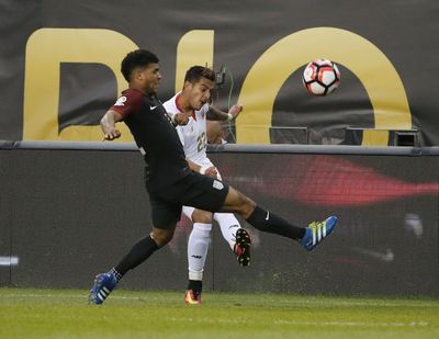 United States’ DeAndre Yedlin (2) and Costa Rica’ s Ronald Matarrita (22) battle during a Copa America Centenario group match on Tuesday won by the U.S. (Charles Rex Arbogast / Associated Press)