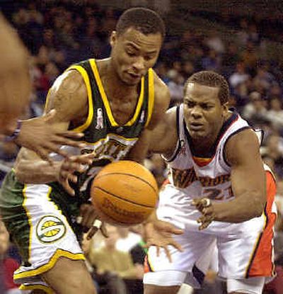 
New Sonics center Danny Fortson, shown here guarding Seattle's Rashard Lewis in 2001, was once one of the league's best rebounders. The Sonics were the worst rebounding team in the NBA last season. 
 (Associated Press / The Spokesman-Review)