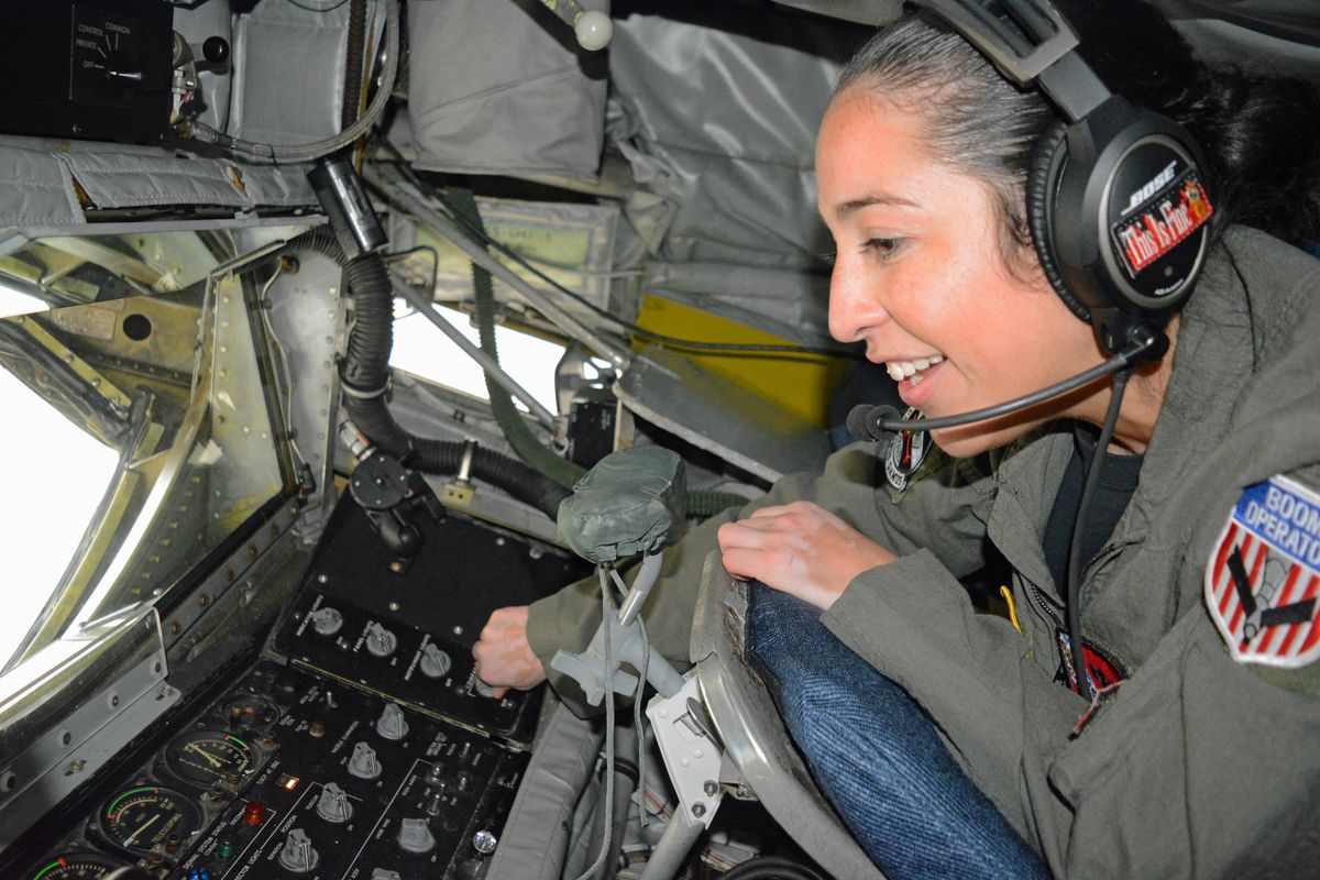 Tech. Sgt. Jenny Cook goes through the instruments contained in a Boeing KC-135 Stratotanker