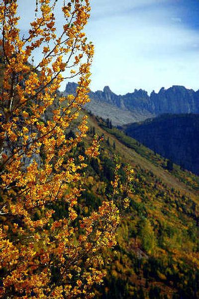 
During prehistoric times, huge glaciers filled the deep valleys of Glacier National Park. At one time, the glaciers carved mountains into very steep and narrow cliffs and at times produced three-sided mountain peaks. 
 (Mike Brodwater photos / The Spokesman-Review)