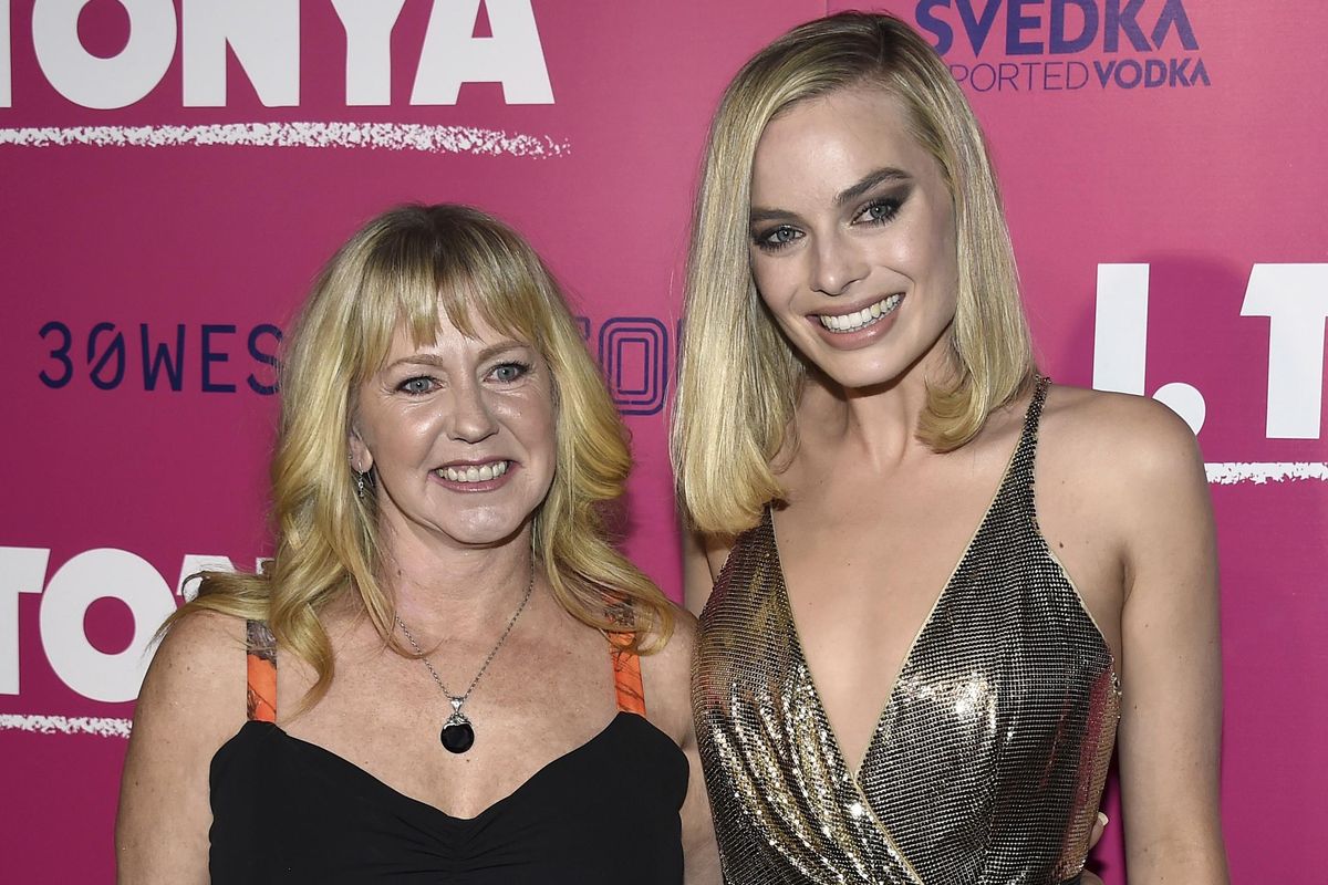 Tonya Harding, left, and Margot Robbie arrive at the Los Angeles premiere of "I, Tonya" at the Egyptian Theatre on Tuesday, Dec. 5, 2017. (Jordan Strauss / Invision/AP)