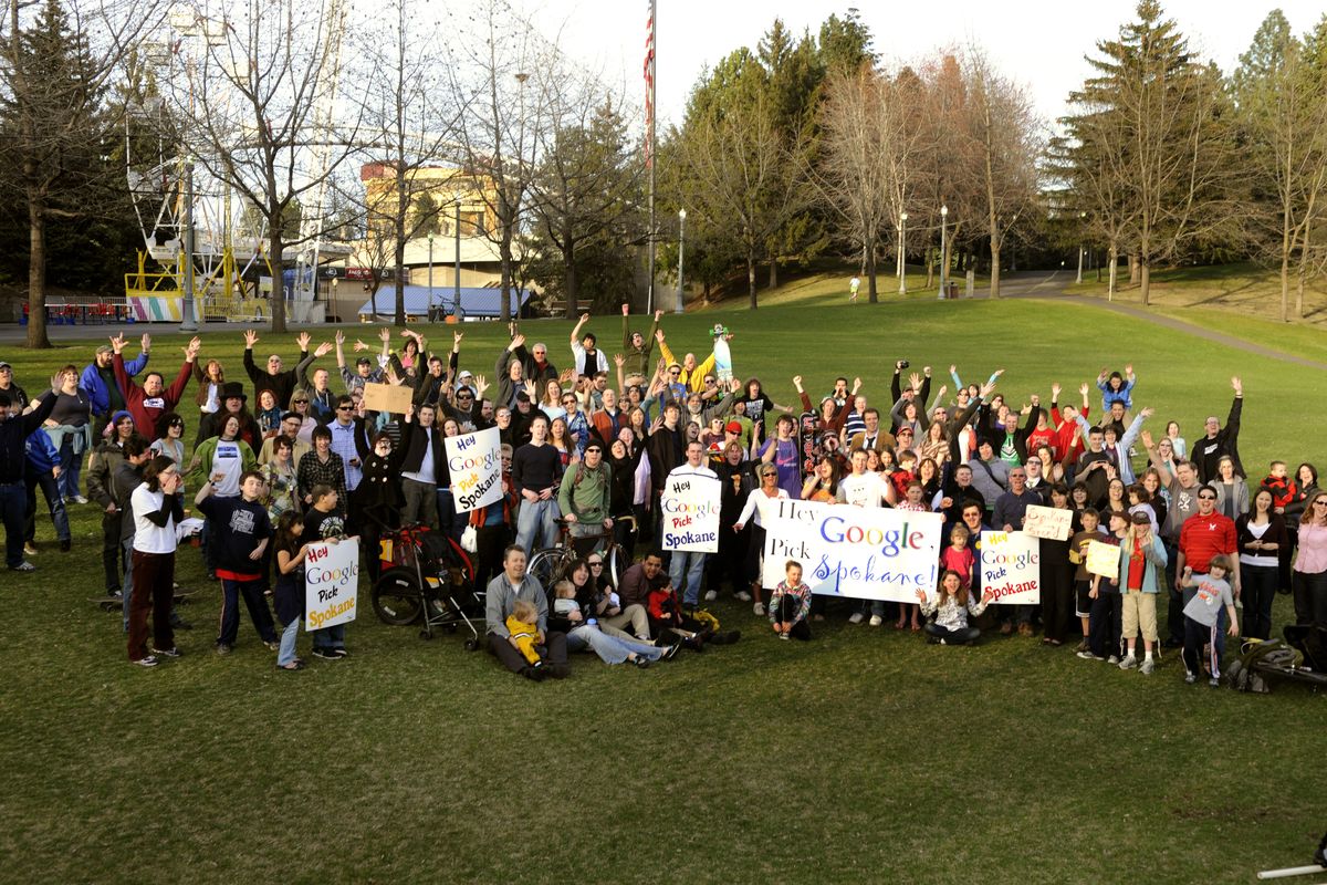 The “Hey Google, Pick Spokane”  gathering poses for a picture in Riverfront Park on Wednesday. (Colin Mulvany)