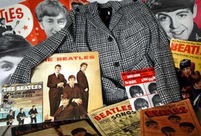 
Among Holly Bickford's Beatles collection  are a  jacket, posters, records, magazines, song books and a rare early recording.
 (Holly Pickett / The Spokesman-Review)