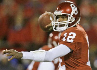 
Oklahoma's Paul Thompson looks for a receiver in the first half. 
 (Associated Press / The Spokesman-Review)