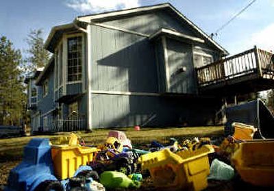 
Toys lie outside the home near Deer Park where Tyler DeLeon lived. Stevens County authorities have opened a criminal investigation into the boy's death. 
 (Holly Pickett / The Spokesman-Review)