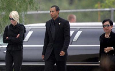 
Tiger Woods, with wife Elin Nordegren and his mother, Kultida, arrives at a reception following  services for his father. 
 (Associated Press / The Spokesman-Review)