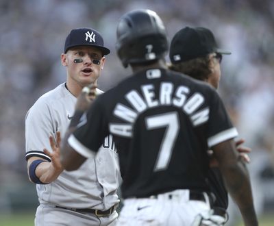 Yankees third baseman Josh Donaldson, left, and White Sox shortstop Tim Anderson, right, share words at third base at Guaranteed Rate Field in Chicago on May 13.  (Chris Sweda/Chicago Tribune/TNS)