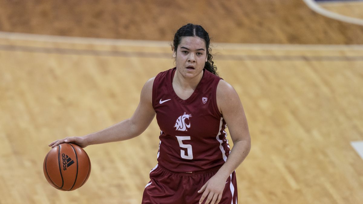 Washington State freshman Charlisse Leger-Walker dribbles during the first half against Washington on Dec. 11 in Seattle, where she made an immediate impact with 20 points and seven rebounds.  (Associated Press)