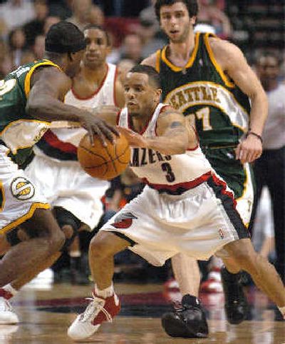 
Damon Stoudamire left Portland for a four-year contract in Memphis. 
 (Associated Press / The Spokesman-Review)