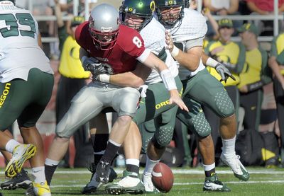 Washington State redshirt freshman quarterback Marshall Lobbestael threw two interceptions and lost a fumble against the Ducks in his first start.  (CHRISTOPHER ANDERSON / The Spokesman-Review)