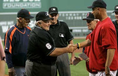 
Veteran umpire Bruce Froemming, center, will retire after this season.Associated Press
 (Associated Press / The Spokesman-Review)