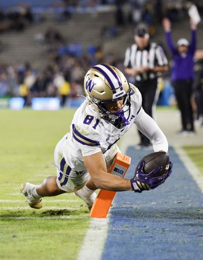Washington wide receiver Dezmen Roebuck dives for a touchdown during the third quarter of the Huskies’ 48-14 win over UCLA in a Big Ten game on Nov. 22 at the Rose Bowl in Pasadena, California.  (Dean Rutz/Seattle Times)