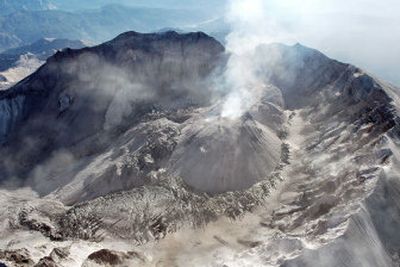 
In this photo provided by the USGS/Cascades Volcano Observatory, Mount St. Helens' crater and dome, and the west arm of the crater glacier are seen from the west on Sept. 12. 
 (Associated Press / The Spokesman-Review)