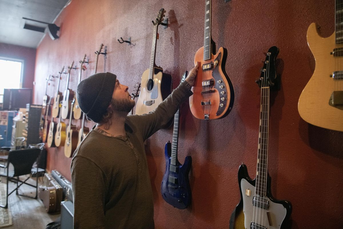 Proprietor Taylor Roff talks about his love of vintage electric guitars, Tuesday, Feb. 4, 2020, in his business, The Senator, a music shop in downtown Spokane. (Jesse Tinsley / The Spokesman-Review)
