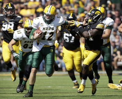 North Dakota State junior quarterback Easton Stick is known for his mobility. (Charlie Neibergall / Associated Press)