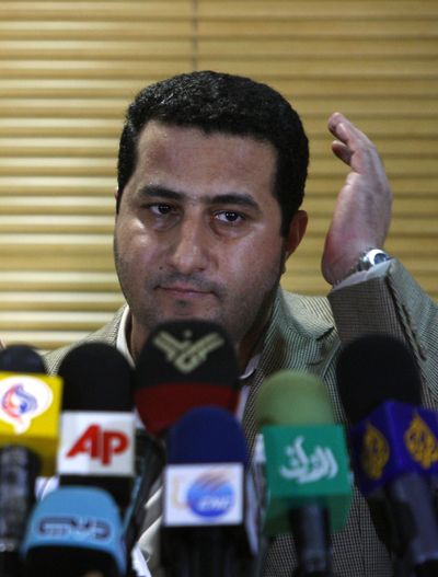 In this July 15, 2010 photo, Shahram Amiri, an Iranian nuclear scientist speaks with journalists at the Imam Khomeini airport, just outside Tehran, Iran, after returning to his homeland from the United States. (Vahid Salemi / Associated Press)