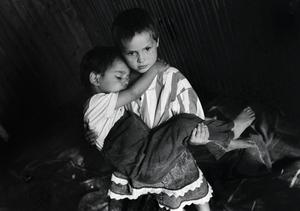 Because these young Romanian orphans at Suta Dragodana in 1996 received only minimal care from uncaring adults, they find ways to take care of each other. (Colin Mulvany/The Spokesman-Review)