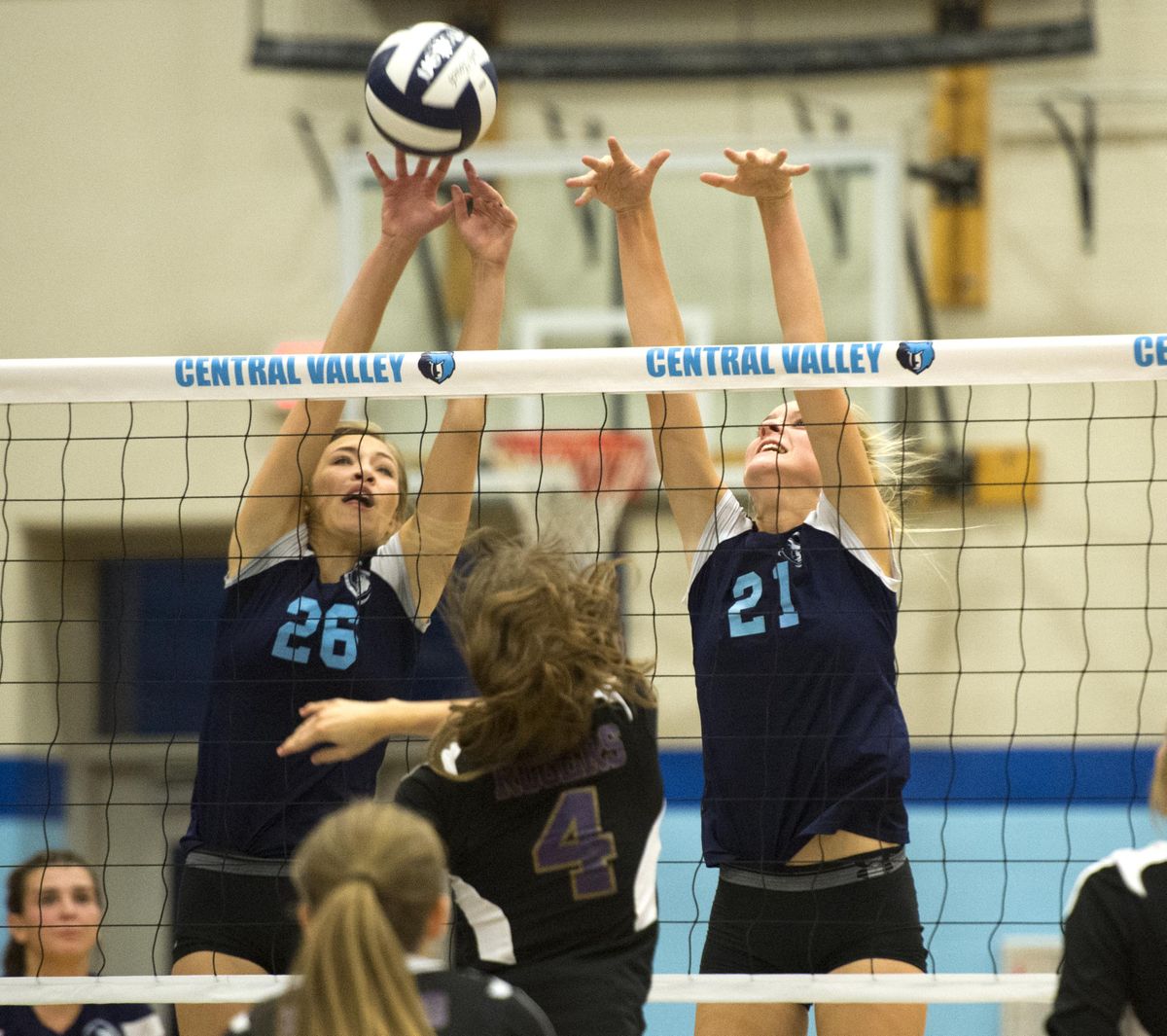Central Valley’s Hannah Reiman, left, and Morgan Nexx team up to block a Rogers Pirates ball during a 2015 preseason nonleague matchup at CV. Business teacher Robin Barnhart is the school’s new activities director. (Jesse Tinsley / The Spokesman-Review)