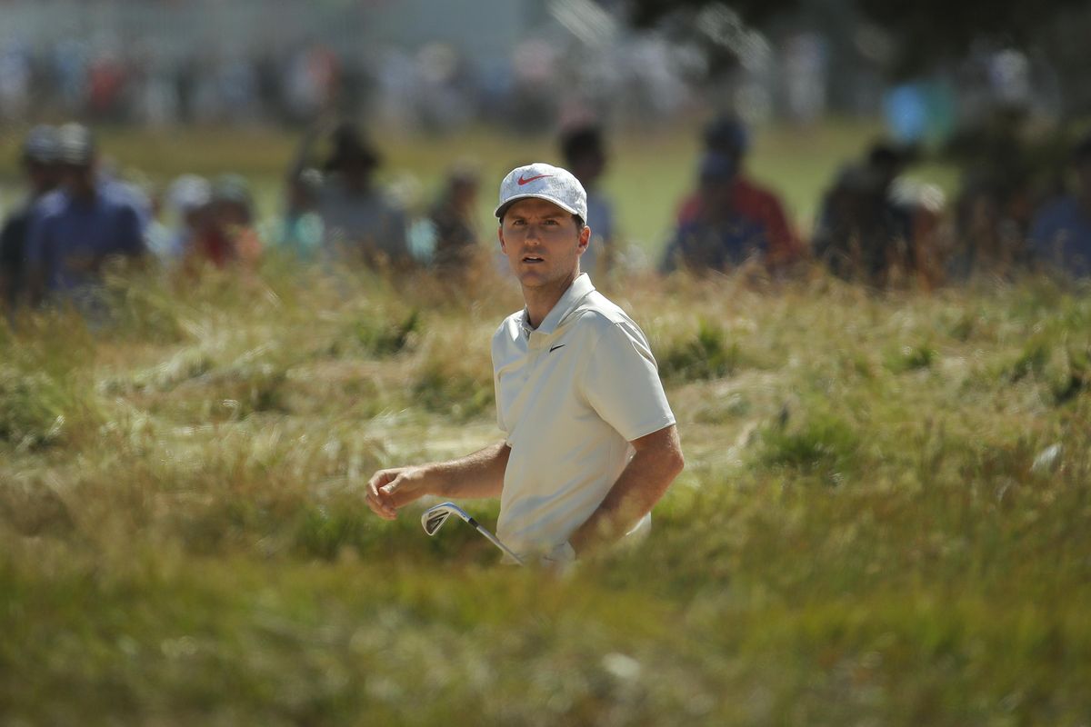 Russell Henley walks through the fescue on the fifth hole during the third round of the U.S. Open Golf Championship, Saturday, June 16, 2018, in Southampton, N.Y. (Carolyn Kaster / AP)