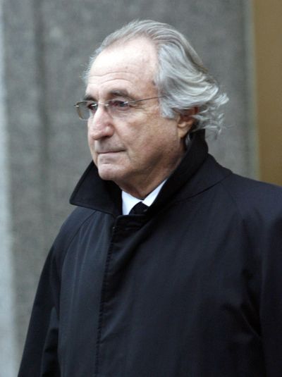 Bernard Madoff, the accused mastermind of a $50 billion Ponzi scheme, leaves federal court in New York last month. The Securities and Exchange Commission on Monday announced an agreement with Madoff that could eventually force him to pay a civil fine and return money raised from investors.  (File Associated Press / The Spokesman-Review)