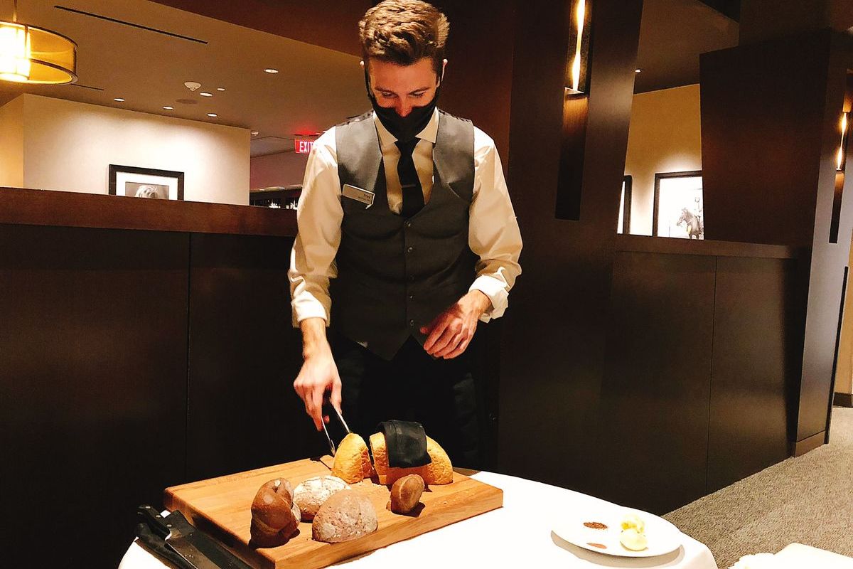 Troy offers bread service at Masselow’s Steakhouse at Northern Quest.  (Don Chareunsy/The Spokesman-Review)