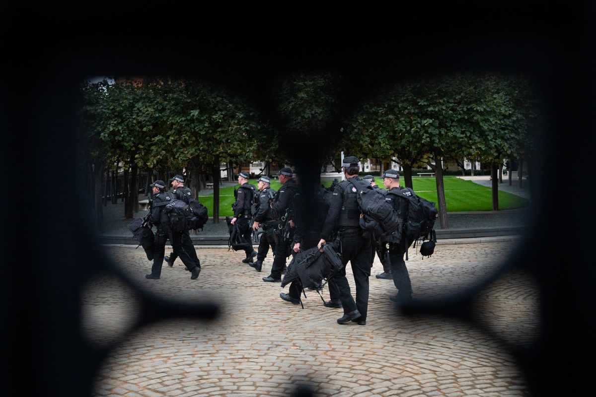 Police officers enter the grounds of the Palace of Westminster in London on Sept. 15. MUST CREDIT: Washington Post photo by Sarah L. Voisin.  (Sarah L. Voisin/The Washington Post)