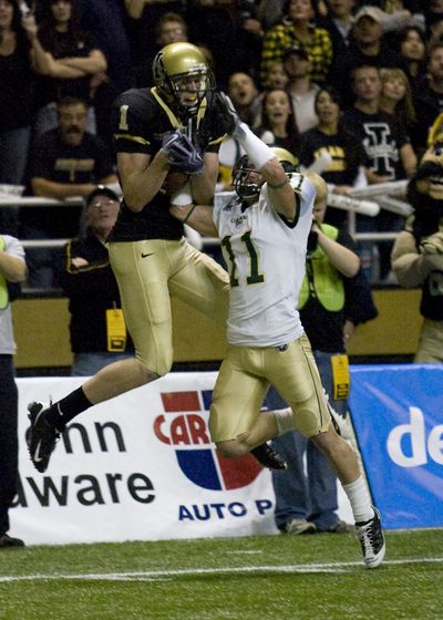 Idaho wide receiver Eric Greenwood, left, catches a first-half touchdown. University of Idaho (Bruce Mann University of Idaho / The Spokesman-Review)