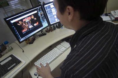 
Marcus Brown of Seven2 Interactive checks on the Web site of the movie 