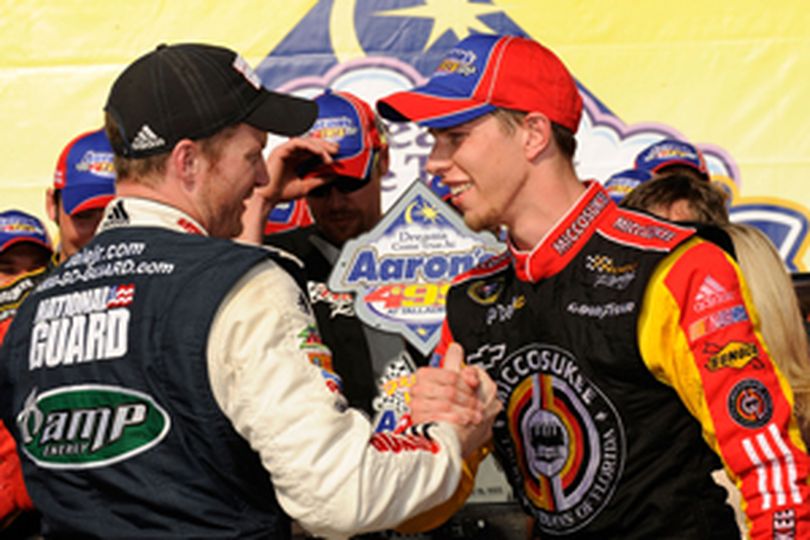 Dale Earnhardt Jr. (left), driver of the No. 88 National Guard/Amp Energy Chevrolet, congratulates Brad Keselowski (right), driver of the No. 09 Miccosukee Chevrolet, in Victory Lane on his first Sprint Cup Series win at the NASCAR Sprint Cup Series Aaron's 499 at Talladega Superspeedway. (Photo Credit: Rusty Jarrett/Getty Images for NASCAR)  (Rusty Jarrett / The Spokesman-Review)