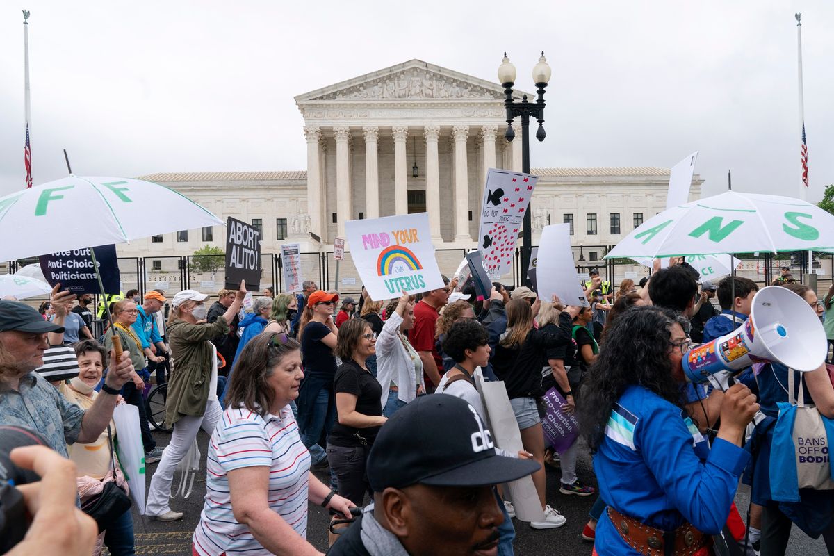Abortion-rights demonstrators coming from the Washington Monument march past the Supreme Court in Washington, Saturday, May 14, 2022.  (Jacquelyn Martin)