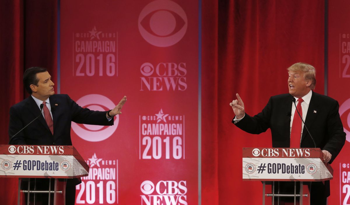 Republican presidential candidate, businessman Donald Trump, right, and Republican presidential candidate, Sen. Ted Cruz, R-Texas, speak at the same time during the CBS News Republican presidential debate at the Peace Center on Feb. 13,  in Greenville, S.C. (John Bazemore / Associated Press)