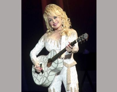 Dolly Parton performs in concert during her Pure & Simple Tour on June 15, 2016 in Philadelphia. (Owen Sweeney / Associated Press)