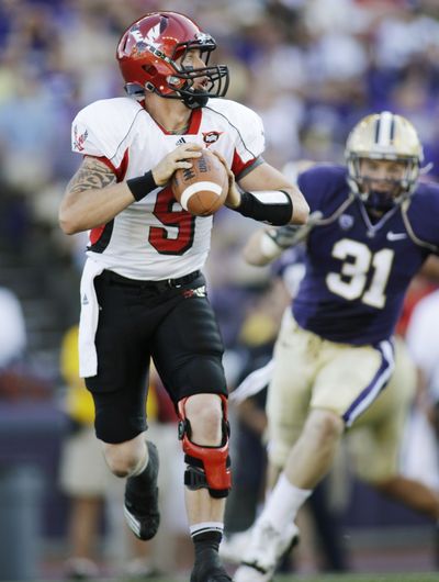 Eastern Washington University quarterback Bo Levi Mitchell is a finalist for the Walter Payton award. The winner will be announced on Friday, Dec. 6. (Ted Warren / Associated Press)