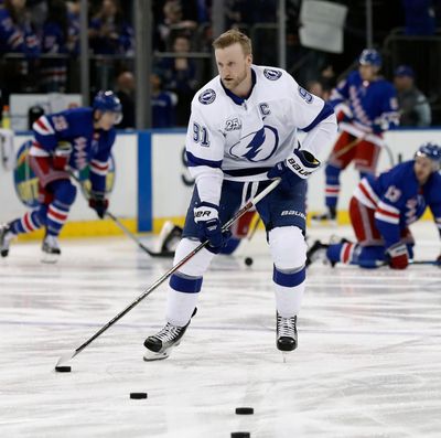 In this March 30, 2018, file photo, Tampa Bay Lightning center Steven Stamkos (91) warms up before playing against the New York Rangers in an NHL hockey game, in New York. Lightning captain Steven Stamkos is back on the ice and hoping to be ready for the start of Tampa Bay’s opening-round playoff series against the New Jersey Devils. (Julie Jacobson / Associated Press)
