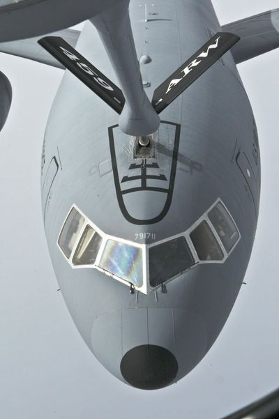 In this Feb. 10, 2009, file photo, a KC-10 plane takes part in a refueling exercise with an Air Force KC-135 plane over the Atlantic Ocean about 300 miles east of New York. After more than 50 years as the military's gas station in the sky – and a decade of attempts to replace it – the KC-135 is showing its age.  (Associated Press)