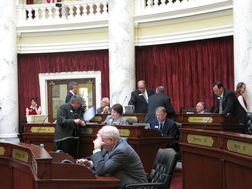 Senate members mill around during a break on Wednesday (Betsy Russell)