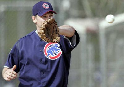 
Oft-injured Cubs pitcher Kerry Wood has a partial tear in his right rotator cuff.
 (Associated Press / The Spokesman-Review)