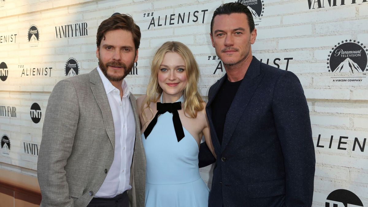 Daniel Bruhl, Dakota Fanning and Luke Evans, shown in 2018, are back for a second season of “The Alienist.” (Willy Sanjuan/The Associated Press)