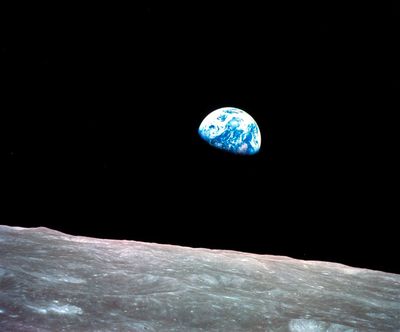 This Dec. 24, 1968, file photo made available by NASA shows the Earth behind the surface of the moon during the Apollo 8 mission.  (William Anders/NASA )