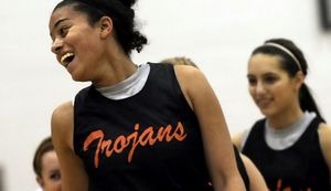 Post Falls High School basketball player Katelyn Loper, a junior, shares a laugh during practice. (Kathy Plonka / The Spokesman-Review)