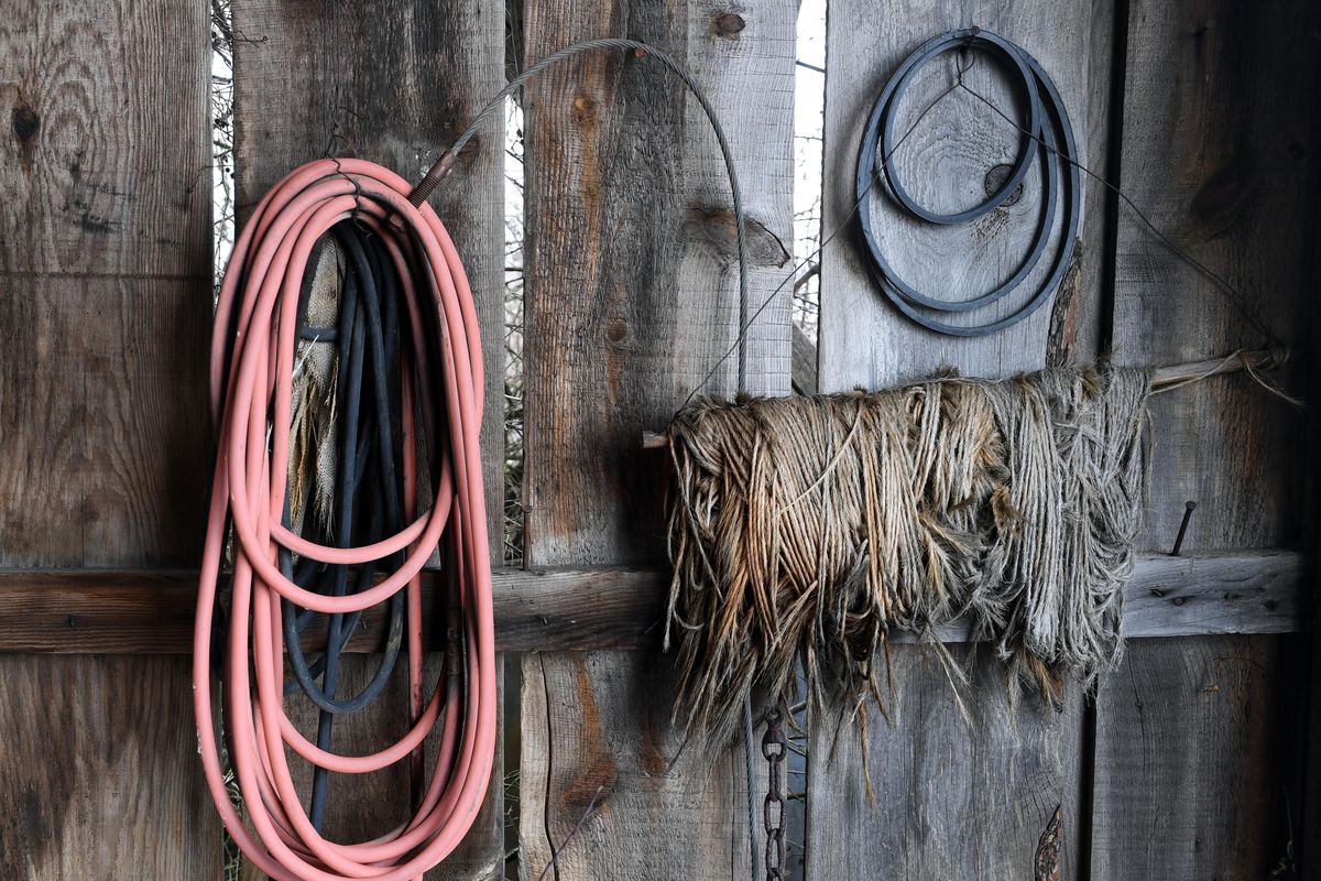 Jeff Torres, who calls himself an explorer, finds buildings and castoff items that tell of hard work and simpler times in an abandoned town on the Palouse during an outing, Monday, Jan. 30, 2017. Jeff has a popular YouTube channel where he posts  videos of his adventures exploring abandoned places. (Jesse Tinsley / The Spokesman-Review)
