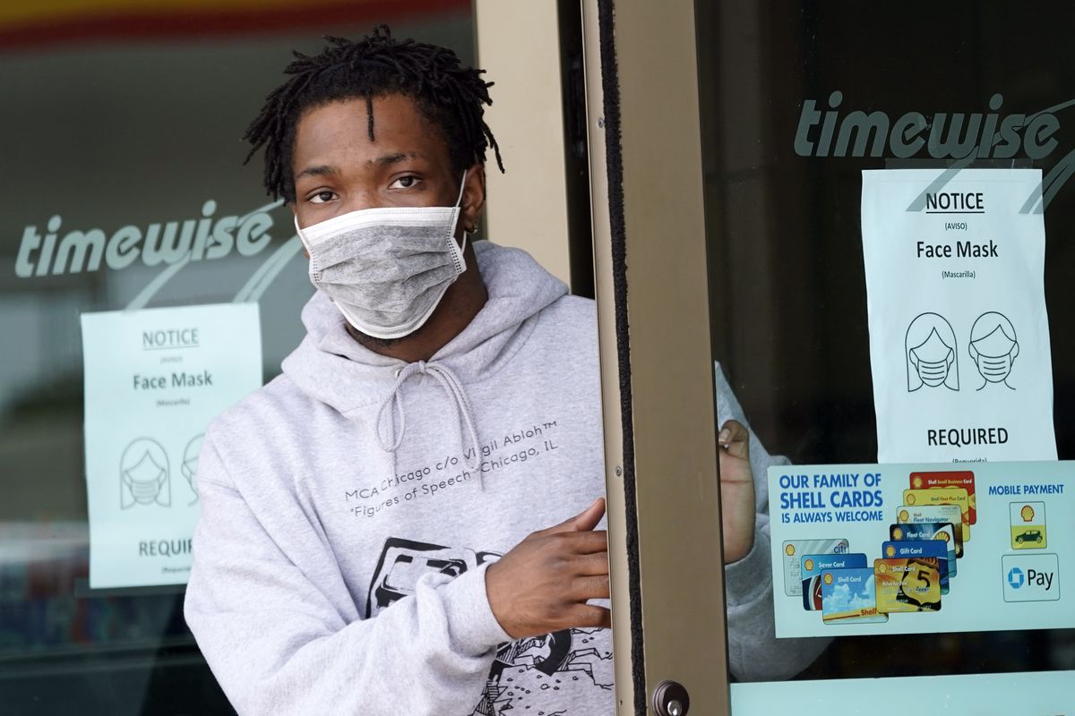 A man leaves a convenience store while wearing a required face mask in Houston in this Thursday, June 25, 2020, photo. Although nearly one-fifth of U.S. states don