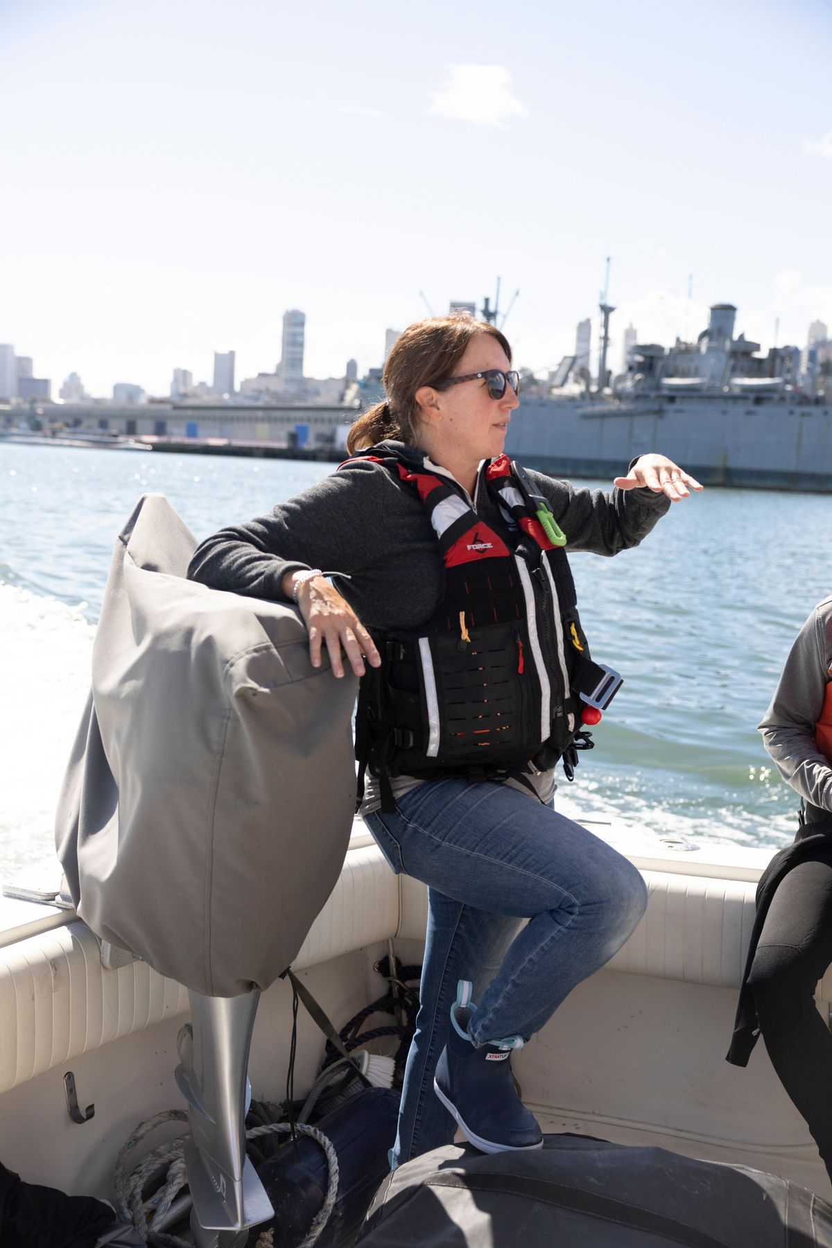 Kathi George of the Marine Mammal Center discussed the route to a buoy fitted with sensors and microphones to detect whales before its checkup, about 25 miles off San Francisco Bay, Calif, on Sept. 19, 2022. The buoy is located off the coast of San Francisco and is routinely checked for damage. (Dexter Hake/The New York Times).  (DEXTER HAKE)