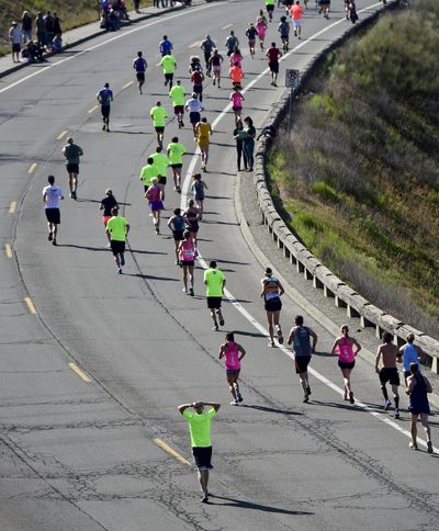 Runners start  up  Doomsday Hill during Bloomsday 2015 on Sunday, May 3, 2015, in Spokane, Wash. (Tyler Tjomsland / The Spokesman-Review)