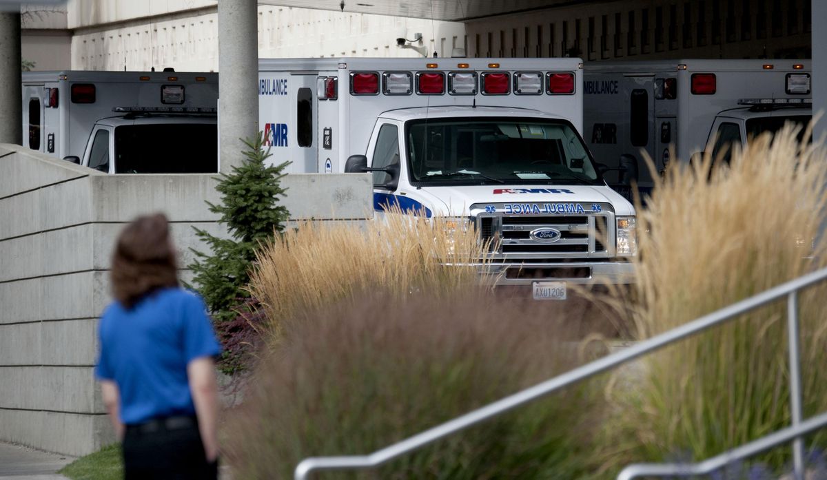 Ambulances line up in the emergency area of Providence Sacred Heart Medical Center. (Kathy Plonka / The Spokesman-Review)