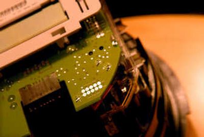 
New Itron meters have computers instead of the old moving wheel technology. 
 (Photo by BRIAN PLONKA / The Spokesman-Review)