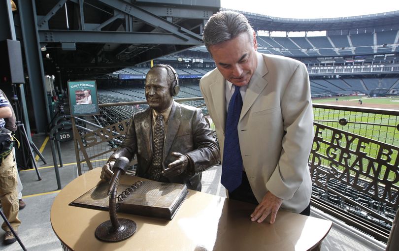Longtime broadcast partner Rick Rizzs steps away after sitting down with a statue of the late Seattle Mariners play-by-play announcer Dave Niehaus, Friday, Sept. 16, 2011, in Seattle. The slightly larger-than-life statue of Niehaus was unveiled in a ceremony that included his widow Marilyn and other family members, team president Chuck Armstrong and former Mariners Jay Buhner and Dan Wilson. The bronze statue is located in the Main Concourse of the Mariners' ballpark, near Section 105 in right-center field. (Elaine Thompson / Associated Press)